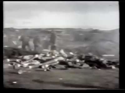 Argentine soldiers firing artillery at Port Stanley. 12JUN1982.