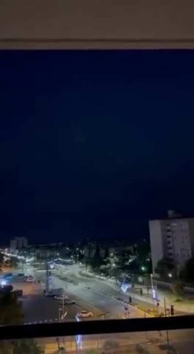 An unidentified projectile which appears to be a ballistic missile hitting something in haifa, Israel. 