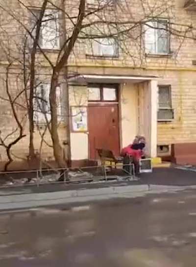 TV getting a beat down by two babushkas