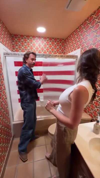 Justin Flom used a shower enclosure covered with a special lenticular lens to make his wife invisible.