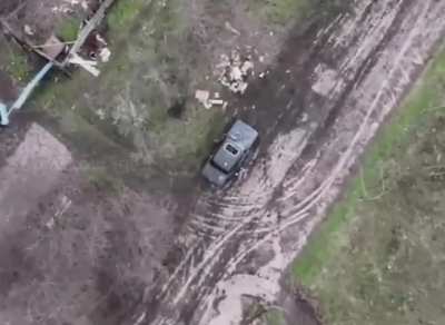 Russian  / DPR guy has worst day ever. Through the sunroof.... Graphic. 
