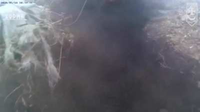 Uncensored version of the video circulating this week of the Russian soldier losing his face in a Ukrainian trench.