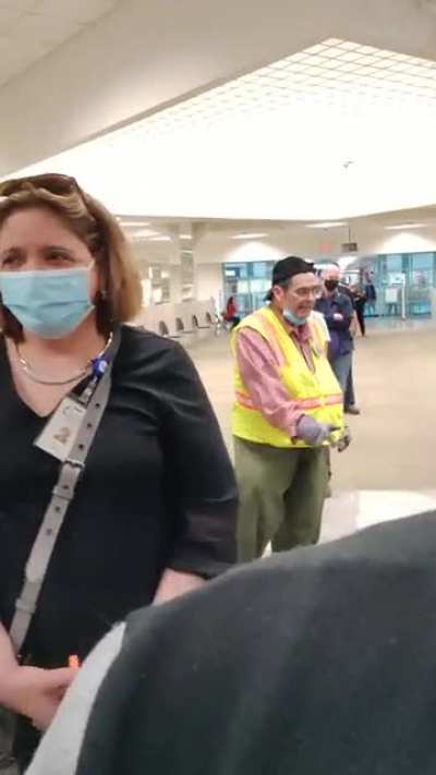 Dude has freakout after being told by security and staff multiple times to wear a mask while in line to vote at a mall. Crowd laughs.