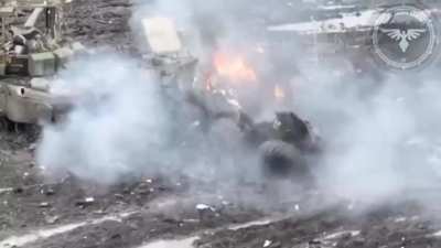 Russians use a BTR as shelter, it is then blown up by Ukrainian troops.