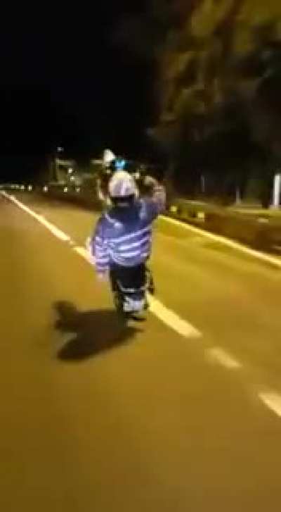 A motorcycle being run over