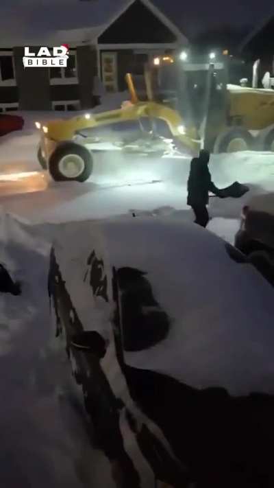 Guy almost done with driveway, plow arrives
