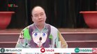 Our country's Prime Minister's giving a speech while wearing a greean T-shirt