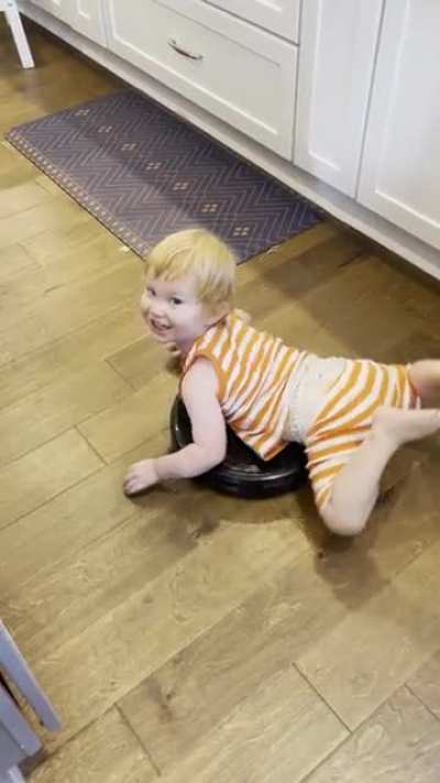 I heard the robot vacuum beeping a bunch in the kitchen so I came around the corner to find this…