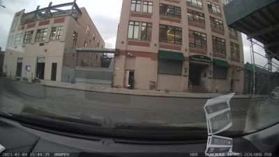 Watch the guy almost get crushed and then takes out the trash. Williamsburg , Brooklyn NY