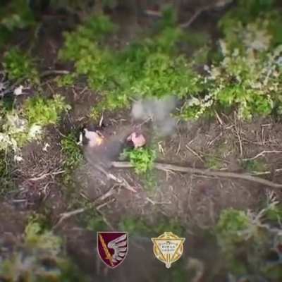 After a Russian tank is disabled, one of its crewmembers is set on fire and targeted by a grenade 