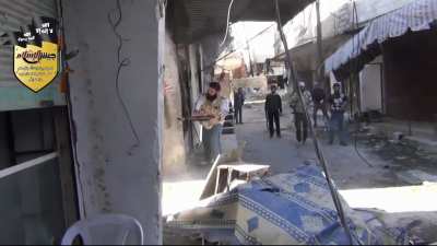 FSA fighters nearly catch incoming rounds while nonchalantly trading fire with SAA positions before bringing in a technical - Tishreen Neighborhood, Damascus - 10/22/2013