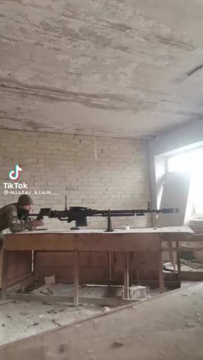 Ukrainian soldiers firing Kord 12.7mm taken from Russian Vehicle (music from source)