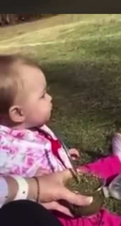 baby tries herbal tea for the first time