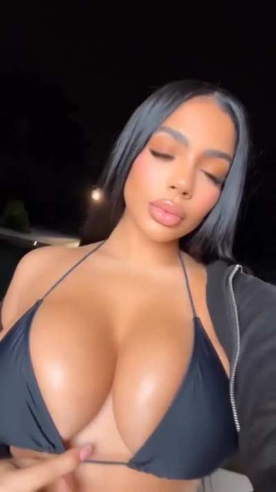 @_officialedot in a black bikini at the pool