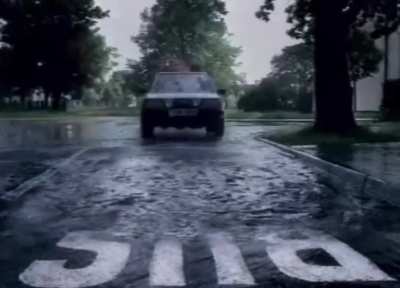Puddles at a bus stop