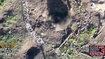 Ukrainian soldier throws a grenade at a russian soldier, which the latter fails to throw away. Place unknown, May 2024