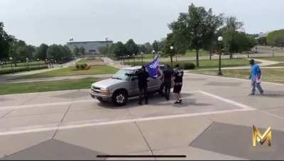 Trump supporter drives onto capitol steps waving trump flag , cops do nothing.