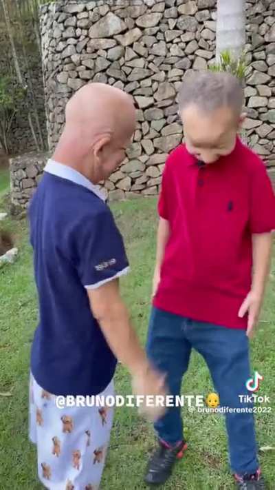 Inspirational 🥲 Old nigga baby taking graduation pictures with his son