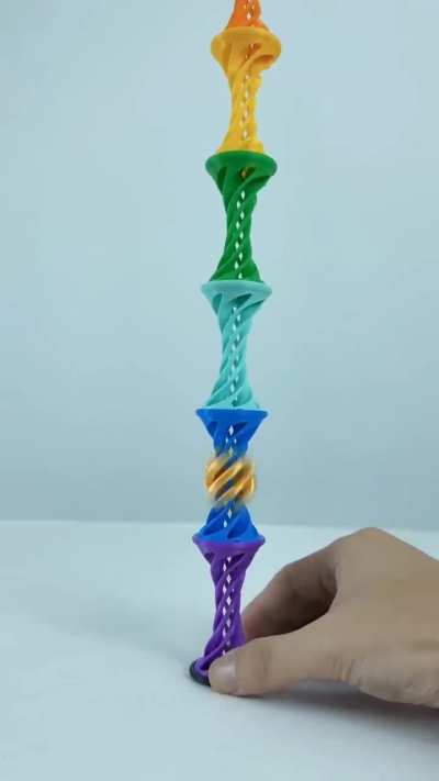 3D printed interlocking spiral and ball