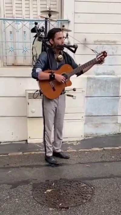 just a man making harmonious sounds by himself.