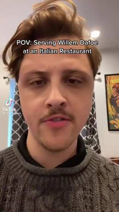 Willem Dafoe at an Italian restaurant.