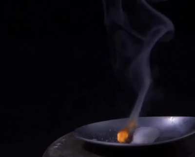 Sodium azide (NaN3) is a super reactive, inorganic compound that decomposes, when ignited, forming its elemental components. 2NaN3 -> 2Na + 3N2 In the video, the sodium metal formed, reacts further with oxygen to create sodium peroxide.