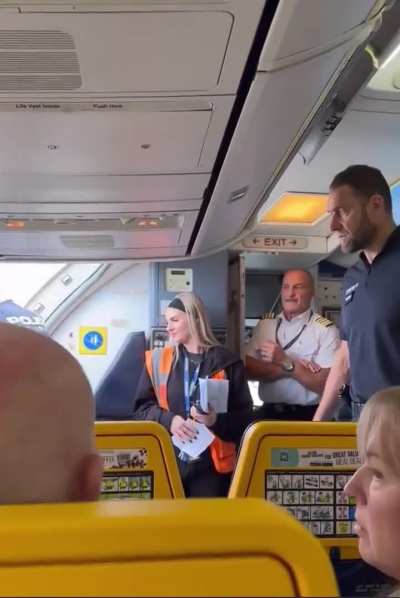 Drunk man gets escorted from the plane