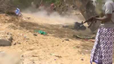 Surprise attack on a Somalian policeman by ISIS militants. Dinili District, Mogadishu, Somalia. 2022.