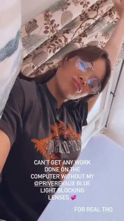 She's looking extra cute with glasses