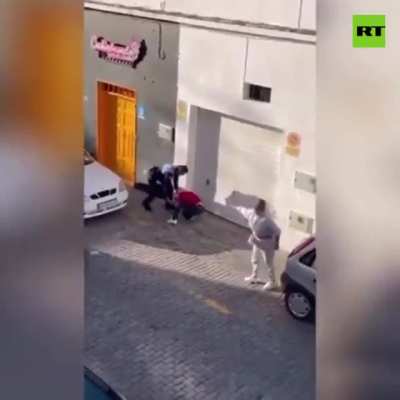 Police in Spain assault people filming them during arrest… and are caught on film