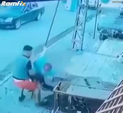 Man grabs electrocuted friend and saves him.