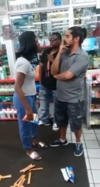 Belligerent Woman spits on store owner because he told her kids to stop running around grabbing chips…