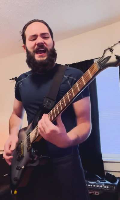 Practicing singing and playing my new original song