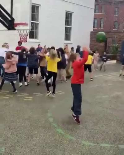 Their teacher promised them hot chocolate if she made the shot