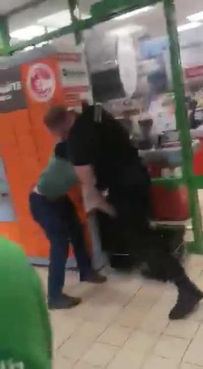 Russia - Guy Steps Up to Store Security, Get's Choked Out
