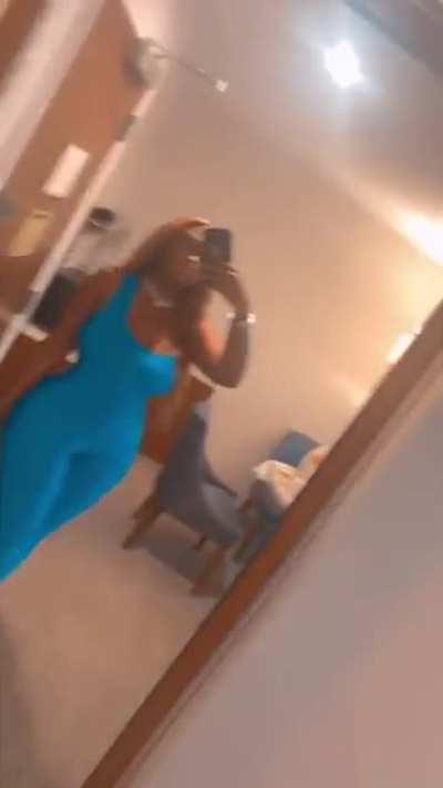 The Hair, The Nails, her eyes, that body of hers, the blue fit, and the holes on it exposing her thighs and ass, the sexy way she’s moving, and the lil’ close up at the end!!! 😩😩💦