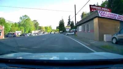 Guy pulls into highway ignoring at incoming traffic