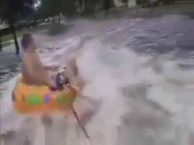 Water tubing in a flooded street