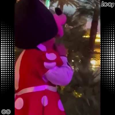 Minnie mouse spotted taking a pull off a durry!
