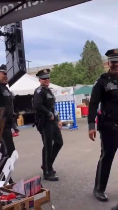 Blursed police officer caricature.
