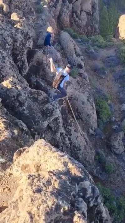 The way he hikes down.