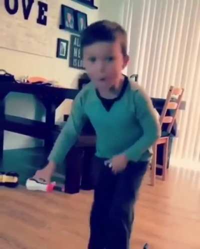 Kid tries nerf gun on the wrong place