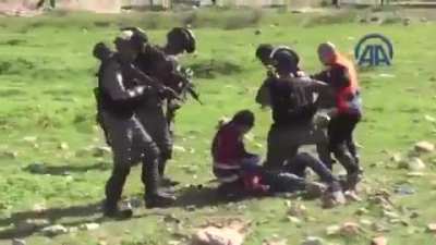 Israeli soldiers attacking Palestinian paramedics as they rescue the injured to save their lives!!!