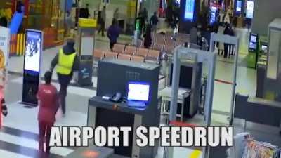 Car drives into airport terminal