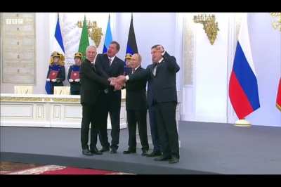 Putin and his Ministers celebrate after annexing four regions of Ukraine