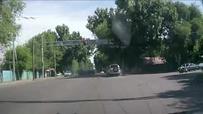 A very violent collision between two cars.