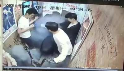 Bringing a electric scooter inside of an elevator.