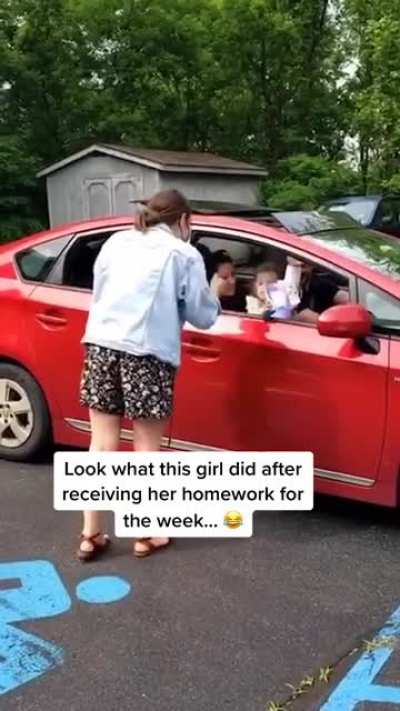 This little girls priceless reaction on getting homework for the week.