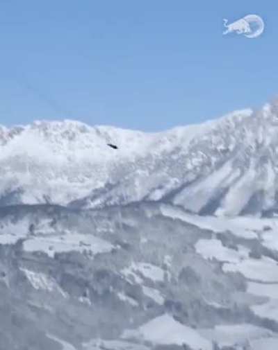 Flight suit and parachutes - epic performance in Kitzbühel, Germany