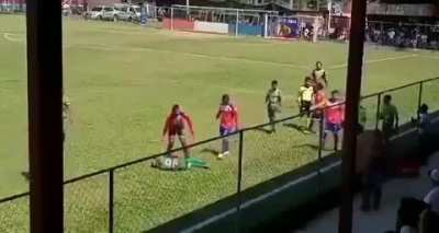 Player in Guatemalan Third Division tries to feign being struck by an object thrown from the crowd